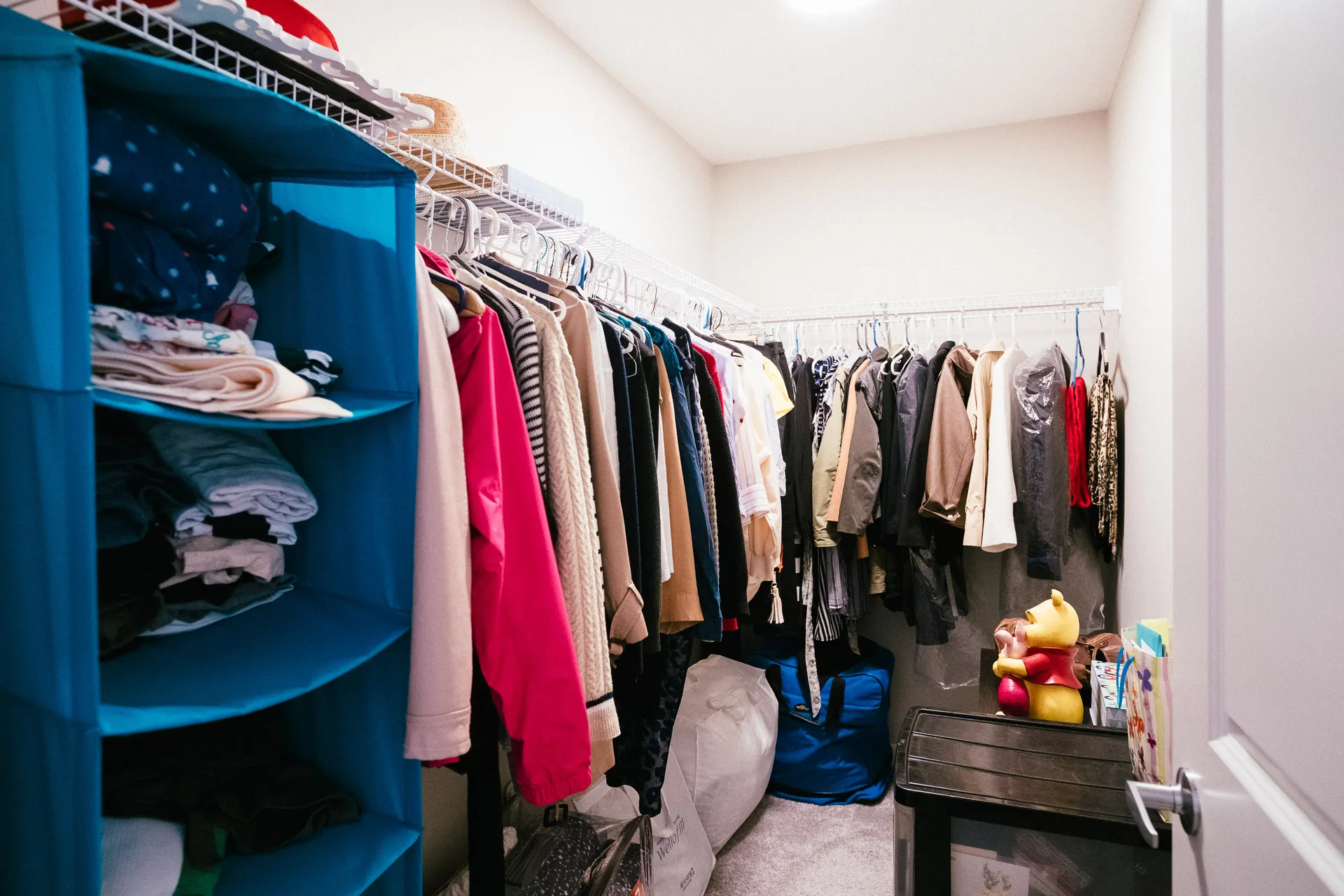 Senior Moving Services Calgary helps organize cluttered closets for a smooth transition